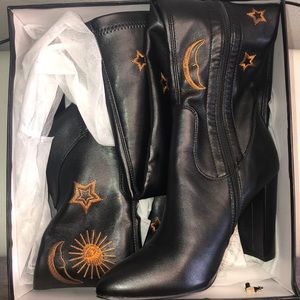 Black boots with pretty sun, moon and stars stitching